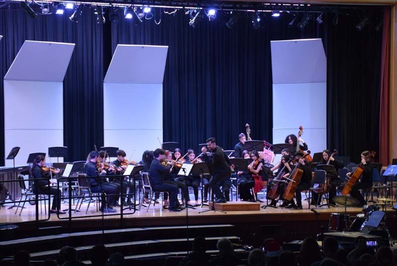 Musicians perform in the auditorium