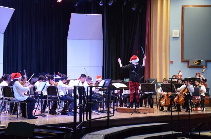 Musicians perform in the auditorium