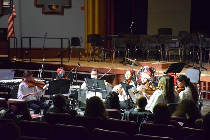 Musicians perform in the auditorium