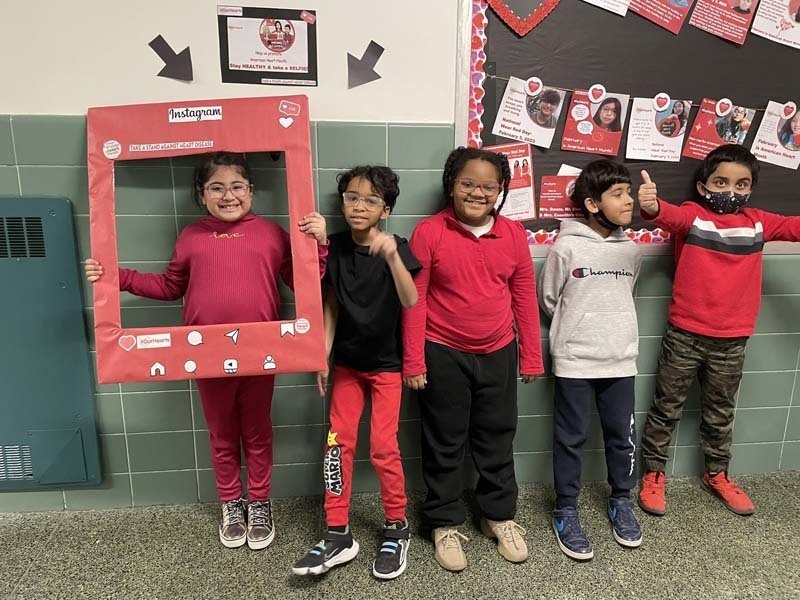 Meadowbrook Elementary School Students wearing red