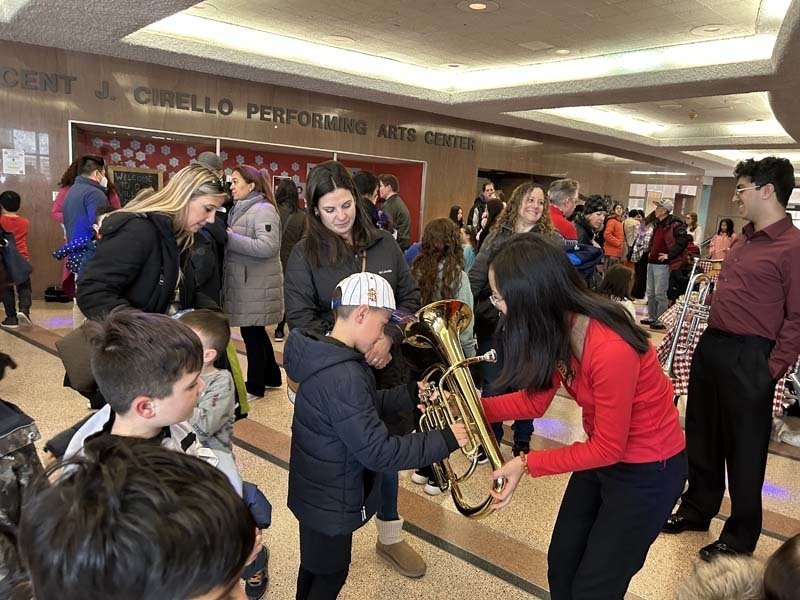 People looking at instruments