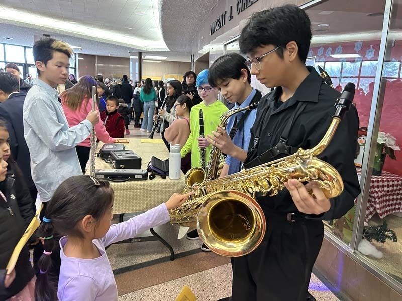 People holding instruments