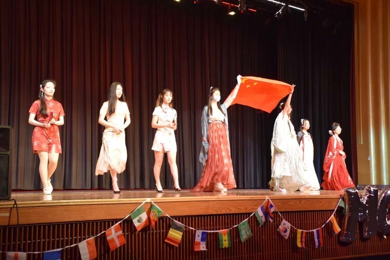 Students performing on a stage